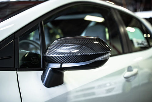 Tom's Racing Carbon Fiber Mirror Caps - Toyota GR Corolla (2023+)